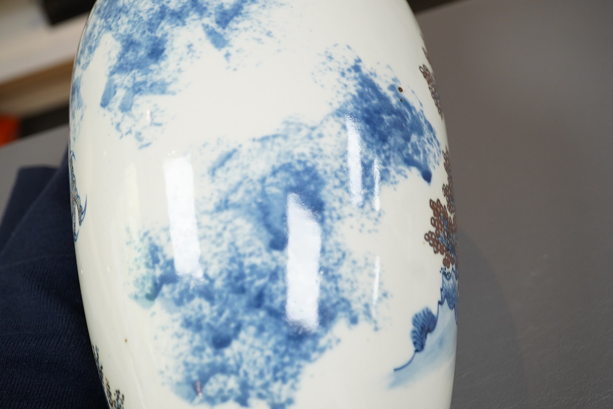 A Chinese underglaze blue and copper red ’dragon and tiger’ baluster vase, possibly 19th century